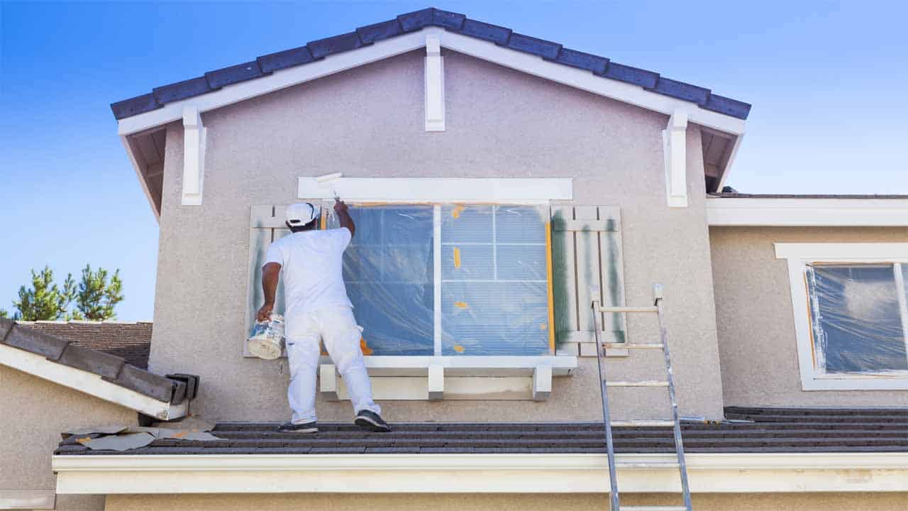 If you are wondering how to paint the exterior of a house with a sprayer then you are in the right place. We have made a small but effective guide on how you can do that. All you need is a tape, a paint sprayer, and two buckets of exterior paint. 