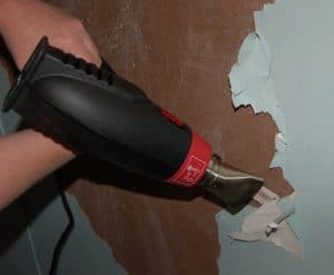 You need to use a heat gun for this process. Stripping paint will help you to redecorate your home and it will help you get better results. The process is easy. You can learn how to strip paint using a heat gun with our guide.