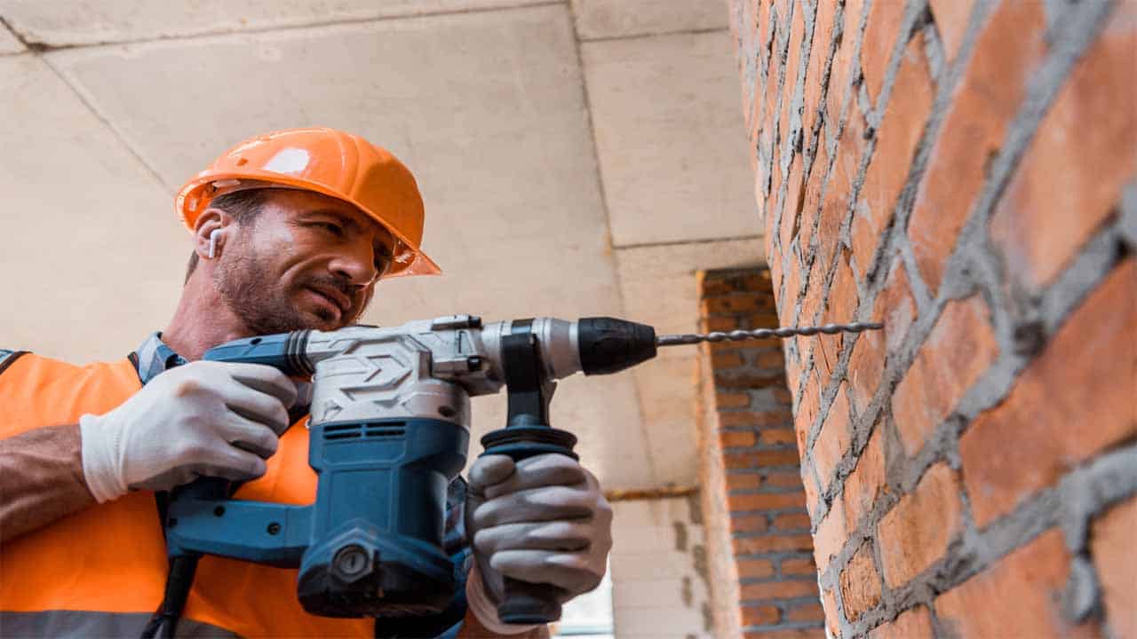 Not everyone knows how to drill through bricks. Bricks can easily break and make a huge mess so being careful is the first step. To do this, you need to have the right tools, using a normal drill won't cut it, you need a hammer drill that has enough power, the oldest the brick the more power the drill needs to have.