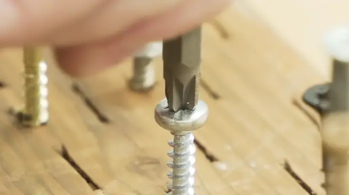 Can I use a left-handed drill bit to remove a stripped screw